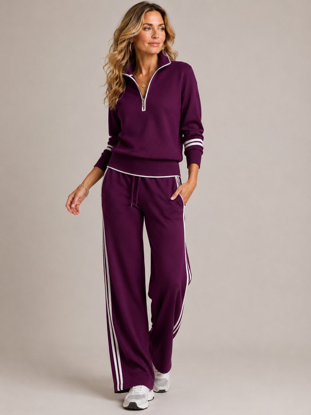 Women's zip sweater and wide-leg trouser set with contrast striped trims