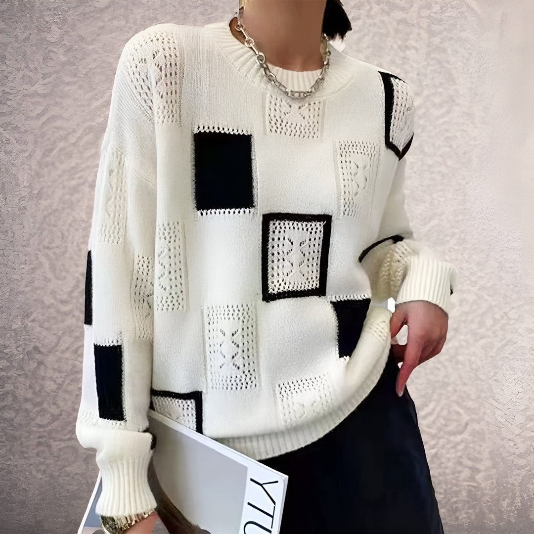 Women's patchwork crew-neck sweater with contrasting geometric panels