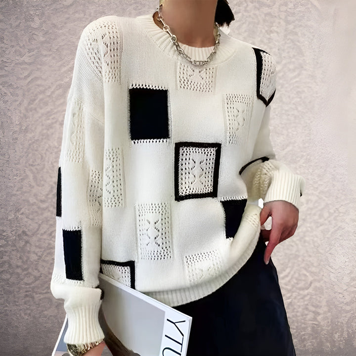 Women's patchwork crew-neck sweater with contrasting geometric panels