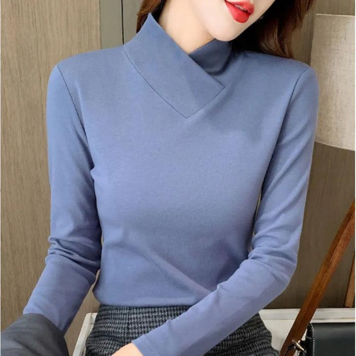 Women's solid long-sleeve turtleneck T-shirt with fitted cut and hip-length hem