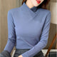Women's solid long-sleeve turtleneck T-shirt with fitted cut and hip-length hem