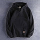Men's hooded half-zip hoodie with long sleeves and kangaroo pocket