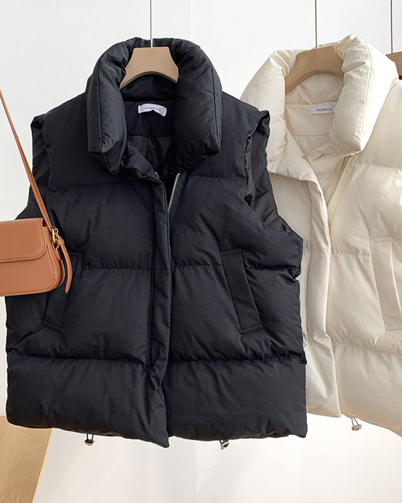Sleeveless quilted puffer vest with stand collar, front zipper and side pockets