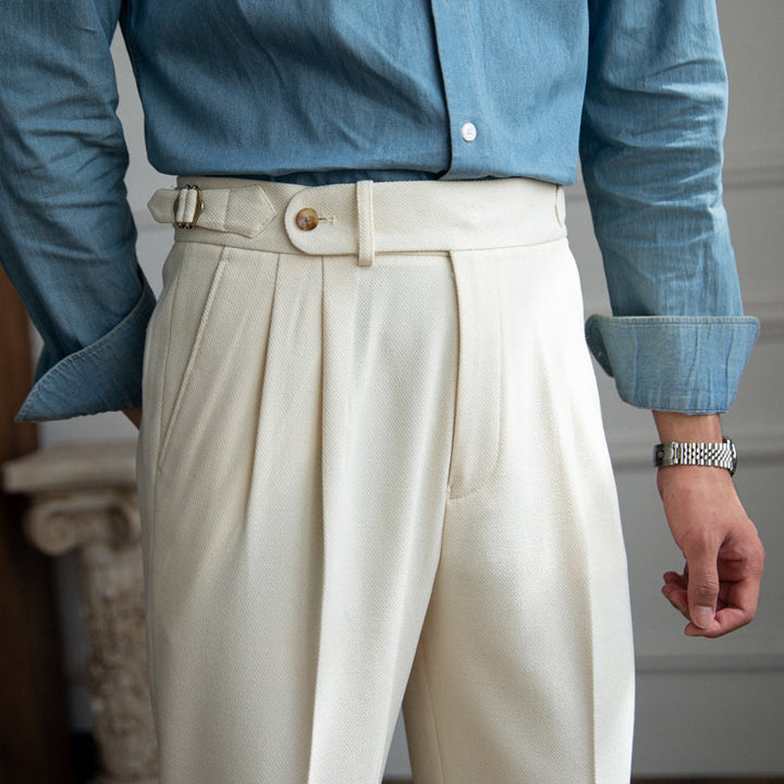 Pleated trousers with side waist tabs, belt loops and cuffed hems