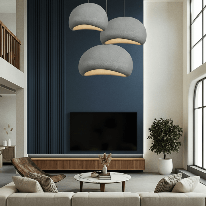 Dome pendant light with warm gold-toned interior and visible bulb