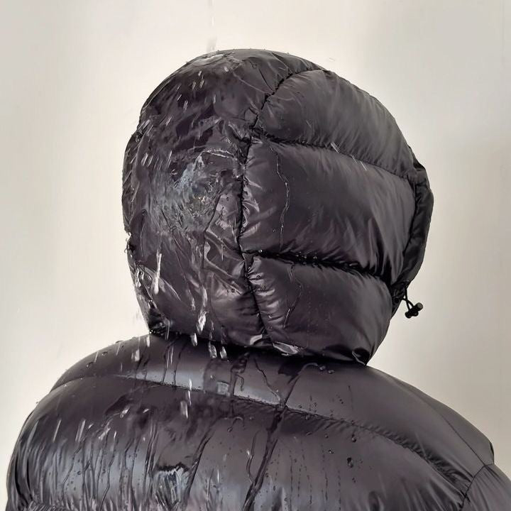 Men's hooded quilted puffer jacket shown in gray and black variants