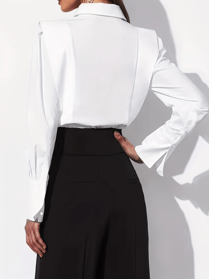 Women's tailored long-sleeve button-up shirt with pointed collar