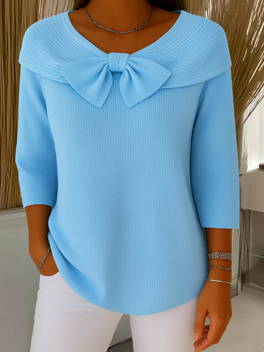 Women's ribbed sweater with round neck, 3/4 sleeves and centre bow detail