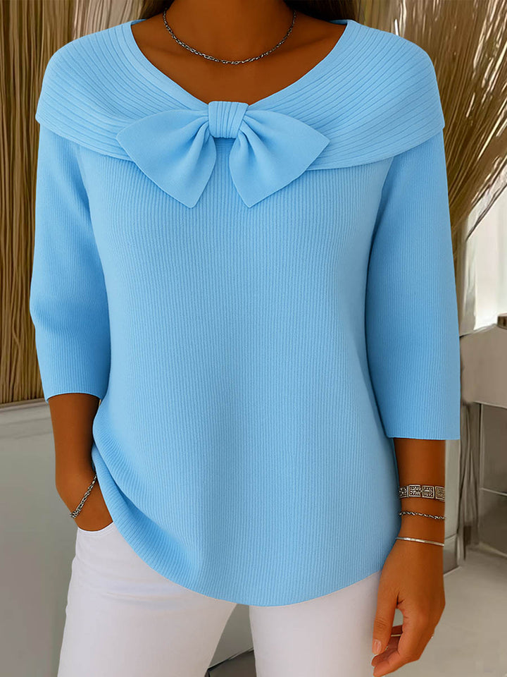 Women's ribbed sweater with round neck, 3/4 sleeves and centre bow detail