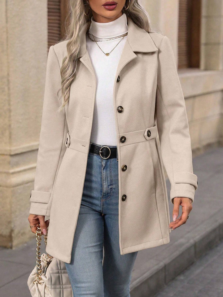 Women's belted trench coat with button front