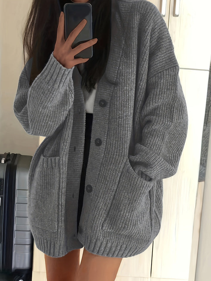 Women's ribbed button-front cardigan with V-neck, long sleeves and patch pockets