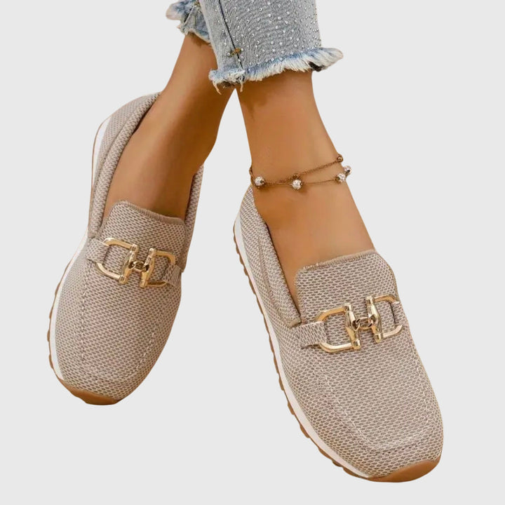 Women's loafer sneakers with metal bar detail and flat textured sole