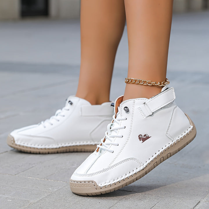 Ankle boots with lace-up fronts, buckle straps and moc toes