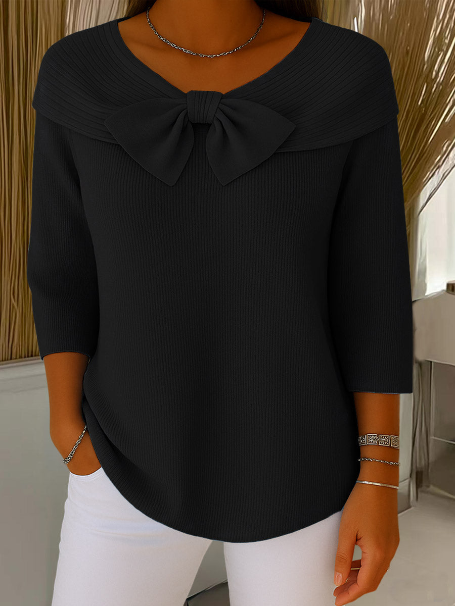 Women's ribbed sweater with round neck, 3/4 sleeves and centre bow detail