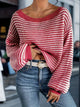 Women's striped knit sweater with crew neckline and long sleeves