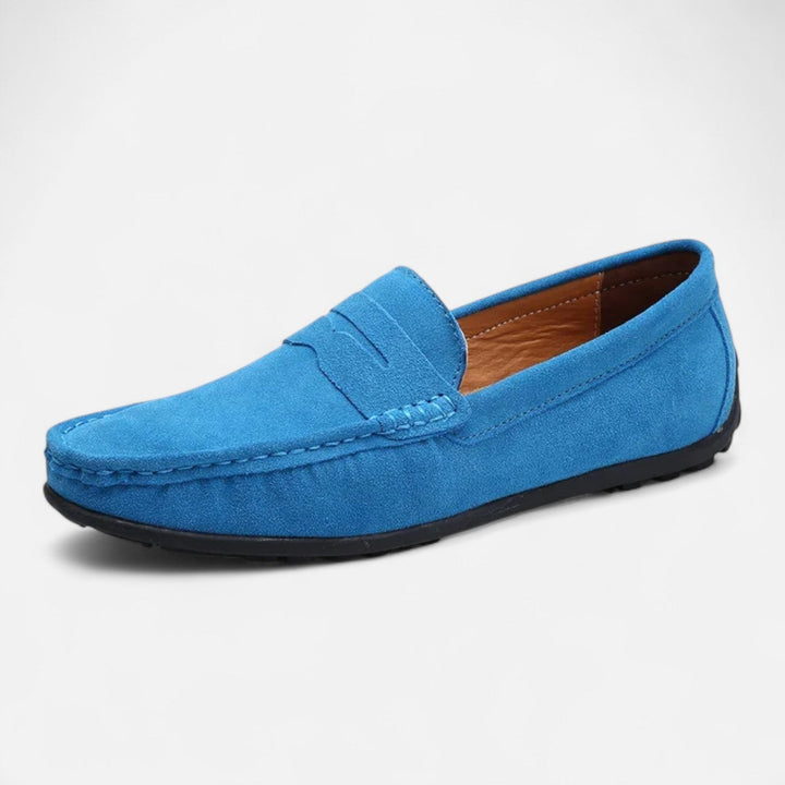 Men's slip-on penny loafer with moc toe stitching and flat sole
