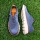 Men's low-top knit lace-up sneakers with round toes and segmented soles