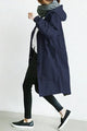 Women's oversized hooded mid-length trench coat with button front and side pockets