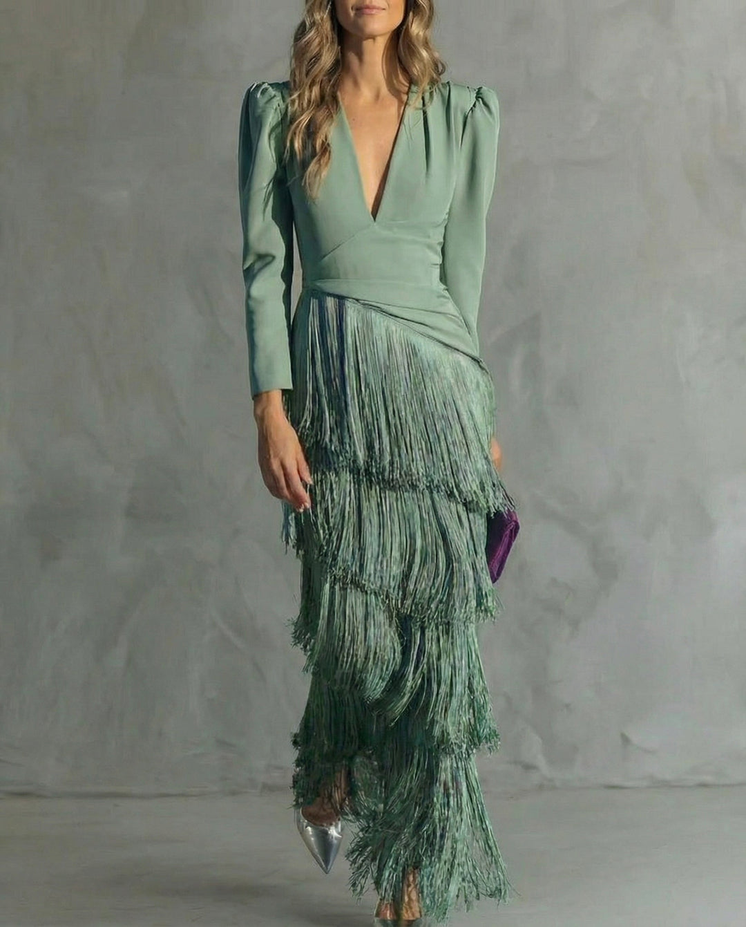 Women's long-sleeve maxi dress with deep V-neck and layered fringe skirt