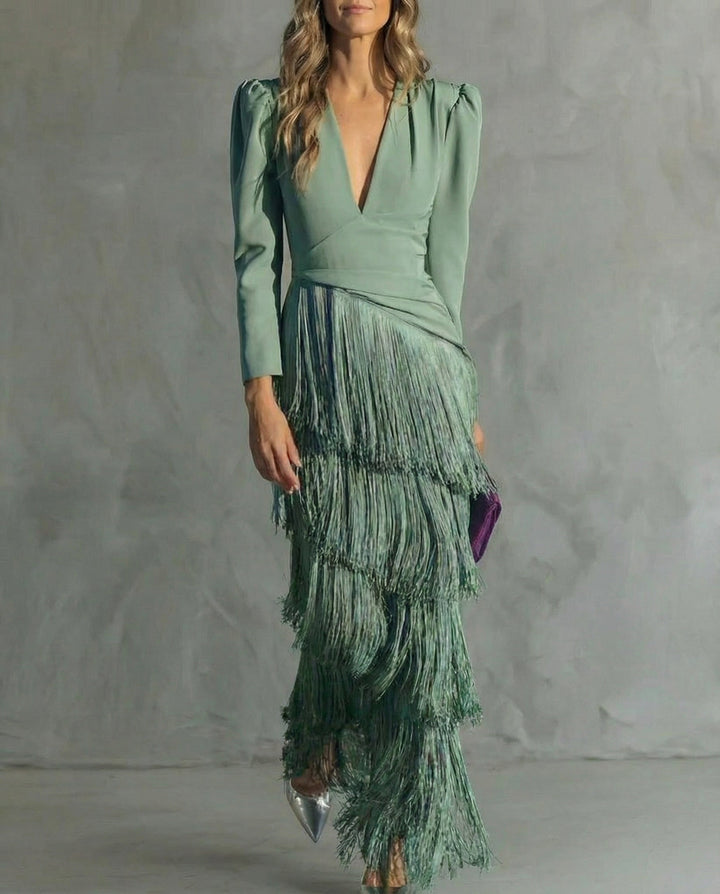 Women's long-sleeve maxi dress with deep V-neck and layered fringe skirt
