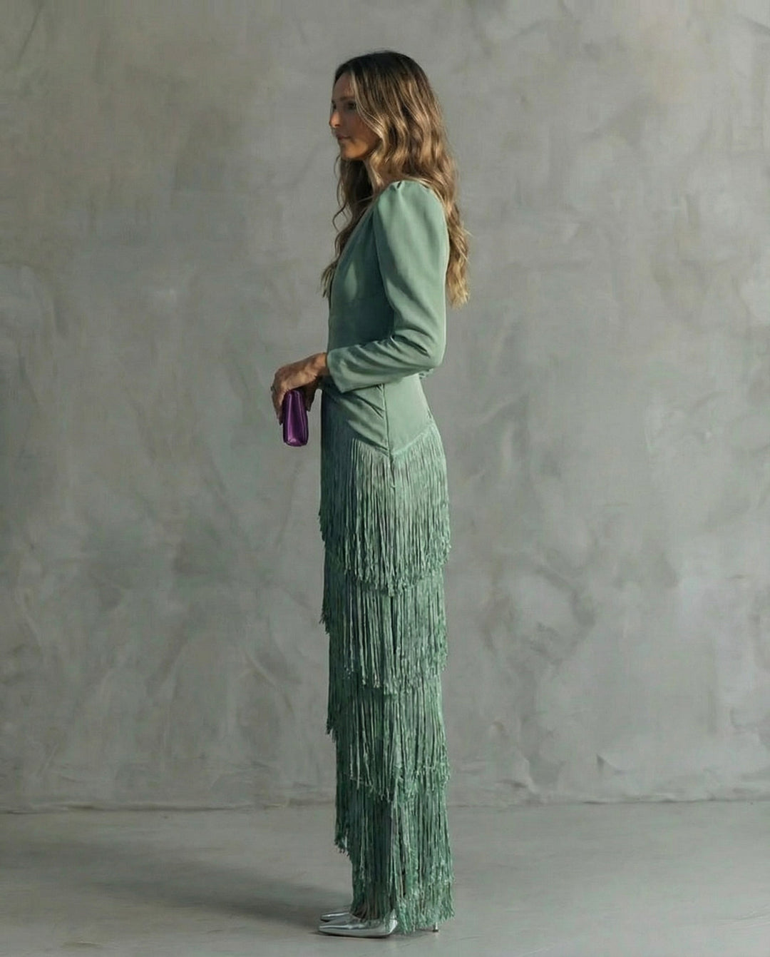Women's long-sleeve maxi dress with deep V-neck and layered fringe skirt