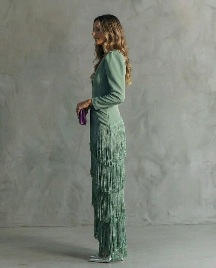 Women's long-sleeve maxi dress with deep V-neck and layered fringe skirt