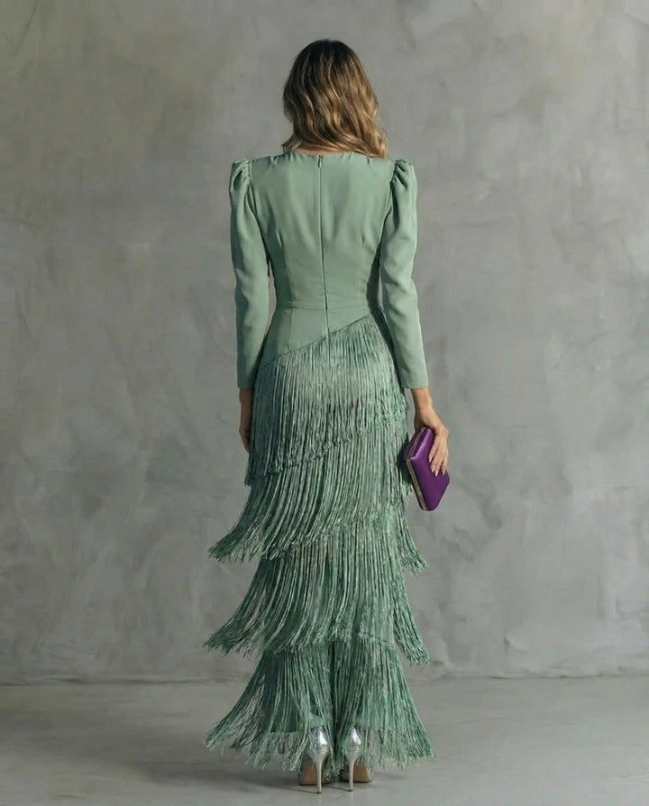 Women's long-sleeve maxi dress with deep V-neck and layered fringe skirt