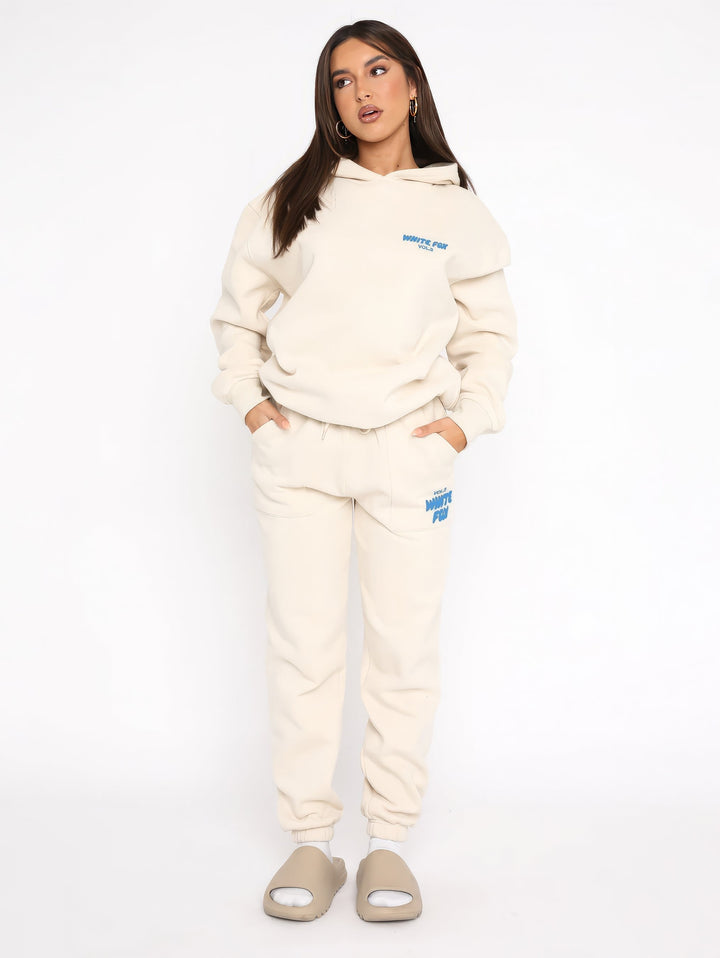 Women's hoodie and jogger tracksuit set with hood and pockets
