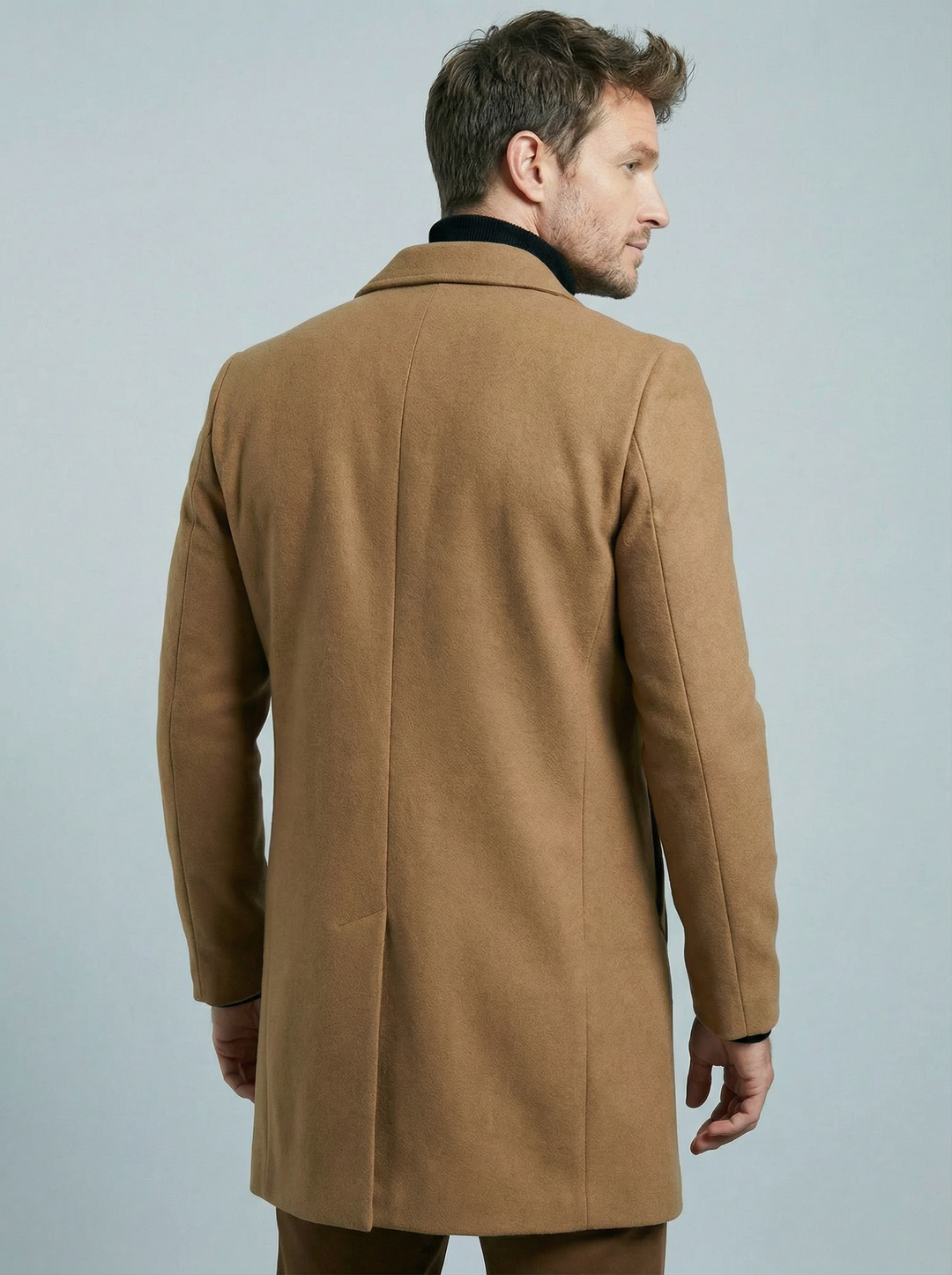 Men's structured long formal coat with notched lapels, button front and welt pockets
