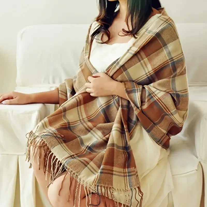 Oversized fringed scarf shown draped around the neck in checked and plain variations