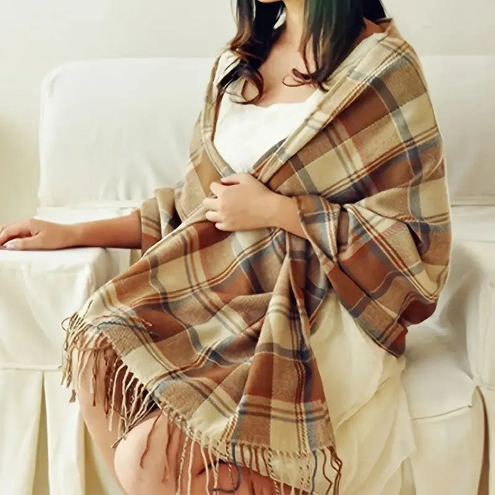 Oversized fringed scarf shown draped around the neck in checked and plain variations