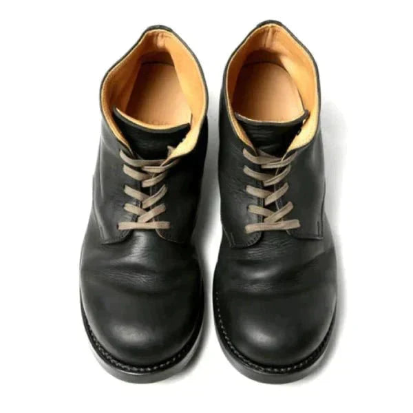 Black and brown lace-up ankle boots with round toes and low heels