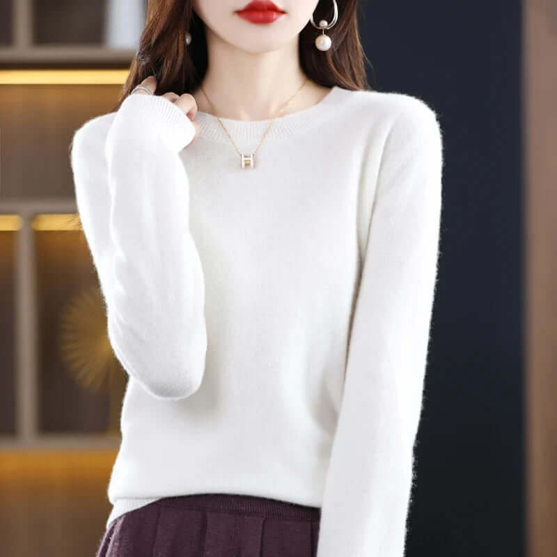 Women's crew neck knitted sweater with long sleeves and ribbed trims