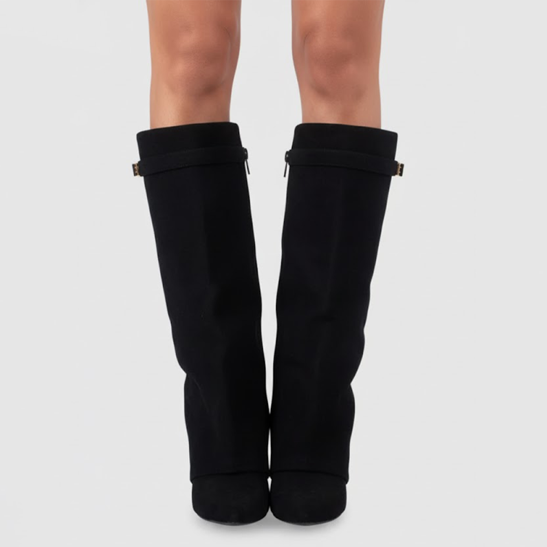 Women's black faux leather over-the-knee boots with buckle detail