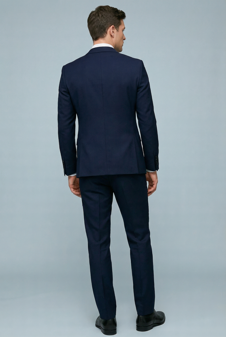 Men's three-piece slim fit suit with tailored jacket and buttoned waistcoat