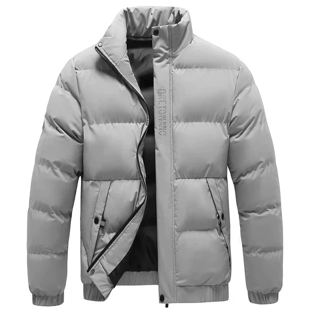 Men's padded quilted jacket with stand collar, long sleeves and zipped pockets