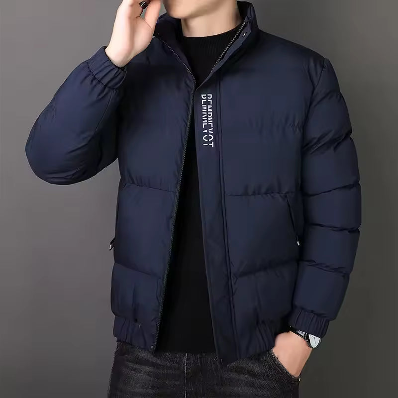 Men's padded quilted jacket with stand collar, long sleeves and zipped pockets