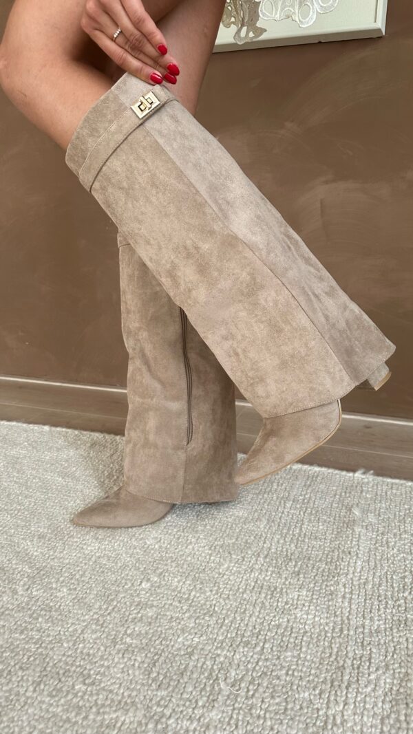 Women's knee-high pointed toe boots with block heel and buckle detail