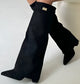 Women's knee-high pointed toe boots with block heel and buckle detail
