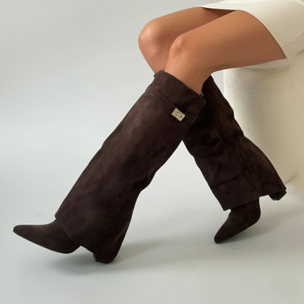 Women's black faux leather over-the-knee boots with buckle detail