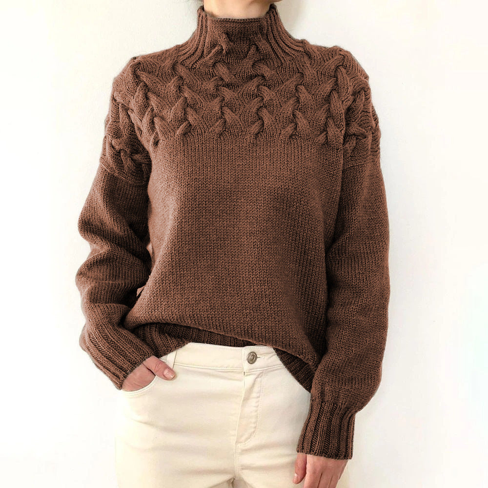 Women's cable knit turtleneck sweater with long sleeves and ribbed trims