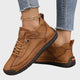 Orthopedic sneakers with white upper and beige sole, worn with jeans