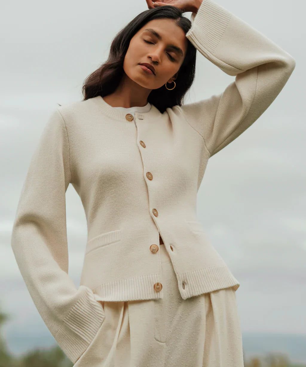 Women's crew neck knit cardigan with button front and long sleeves