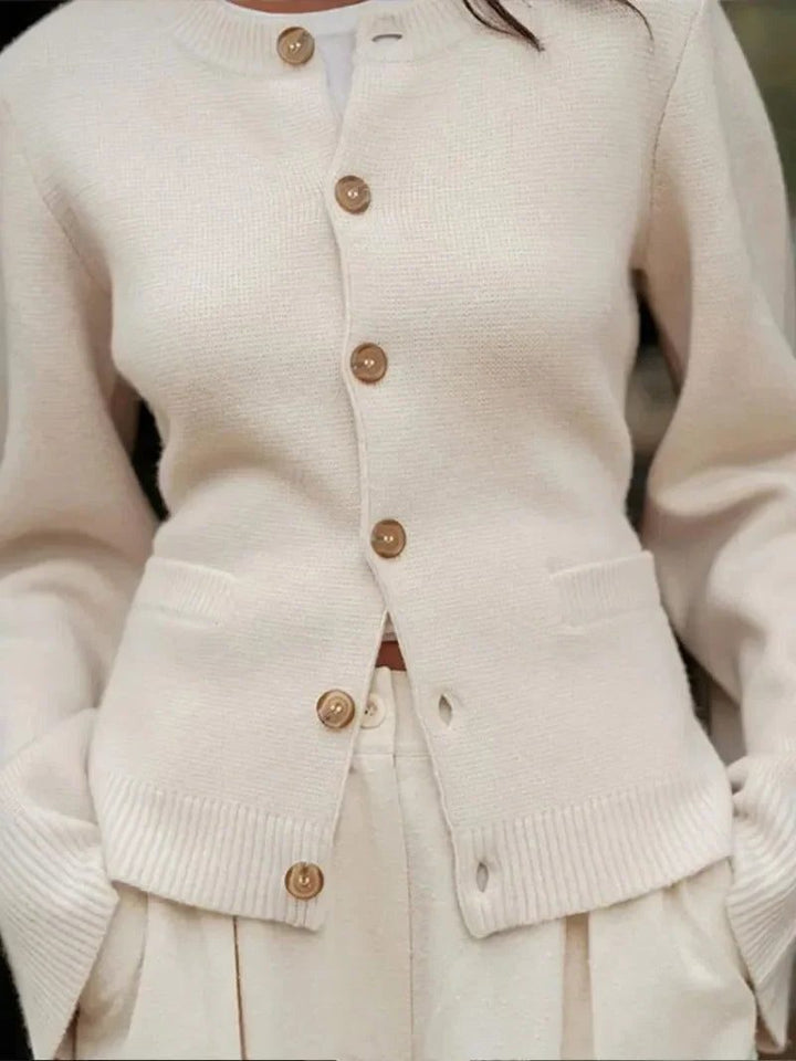 Women's beige crew neck knit cardigan with buttons and ribbed trims