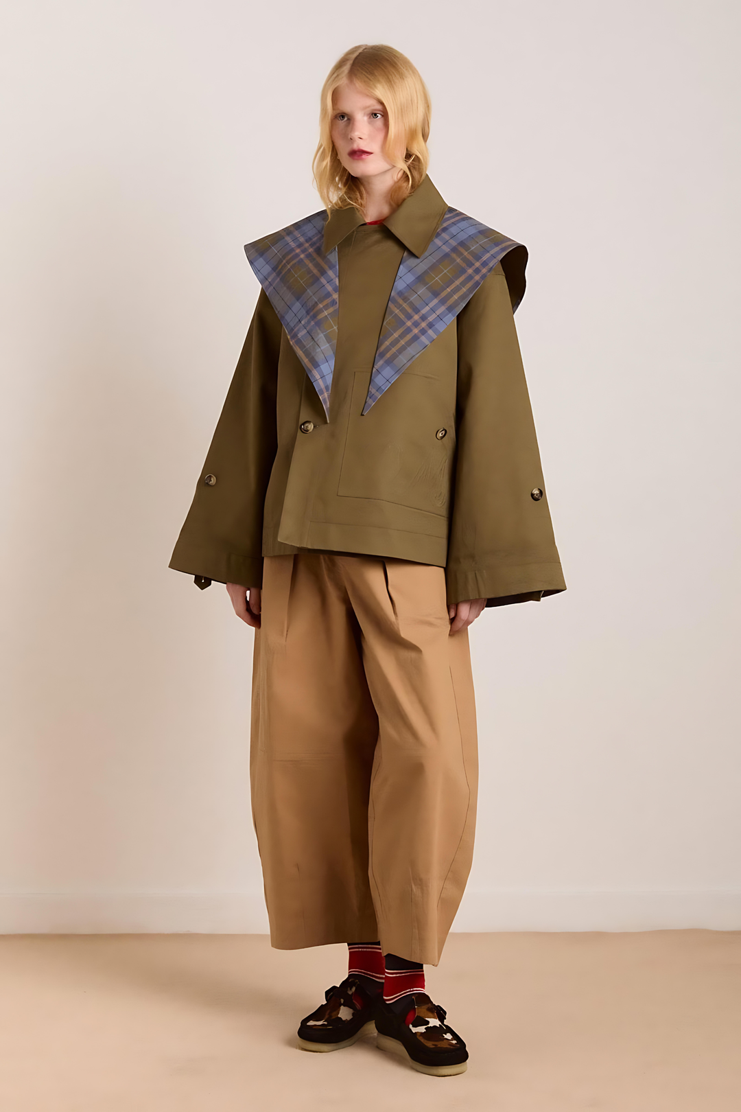 Women's olive utility jacket with blue plaid panels and long sleeves