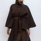 Women's belted cape coat with high collar and button front