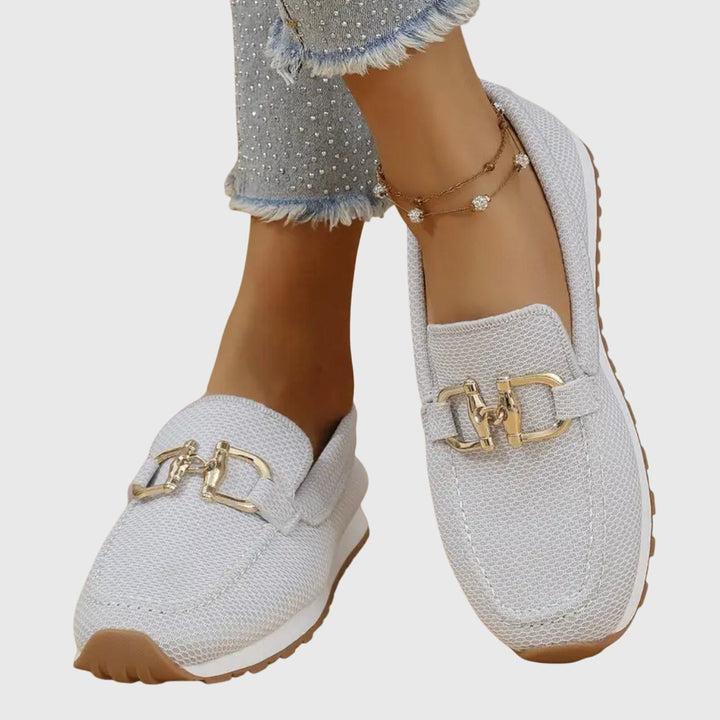 Women's loafer sneakers with metal bar detail and flat textured sole