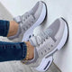Women's panelled lace-up sneakers with raised platform soles