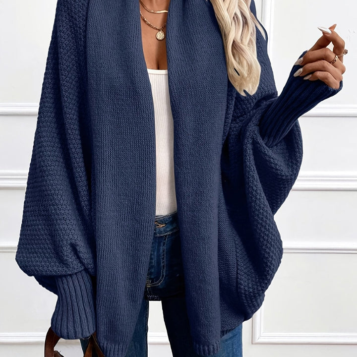Women's draped open-front cardigan with shawl collar and ribbed cuffs