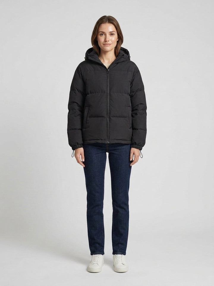 Women's hooded quilted puffer jacket with zip front and adjustable hem